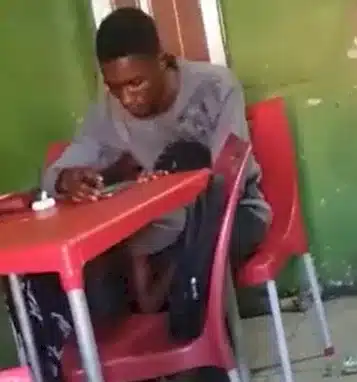 Lady spotted performing 'oral s3x' on her man inside a canteen in broad day light in UNILAG (video)